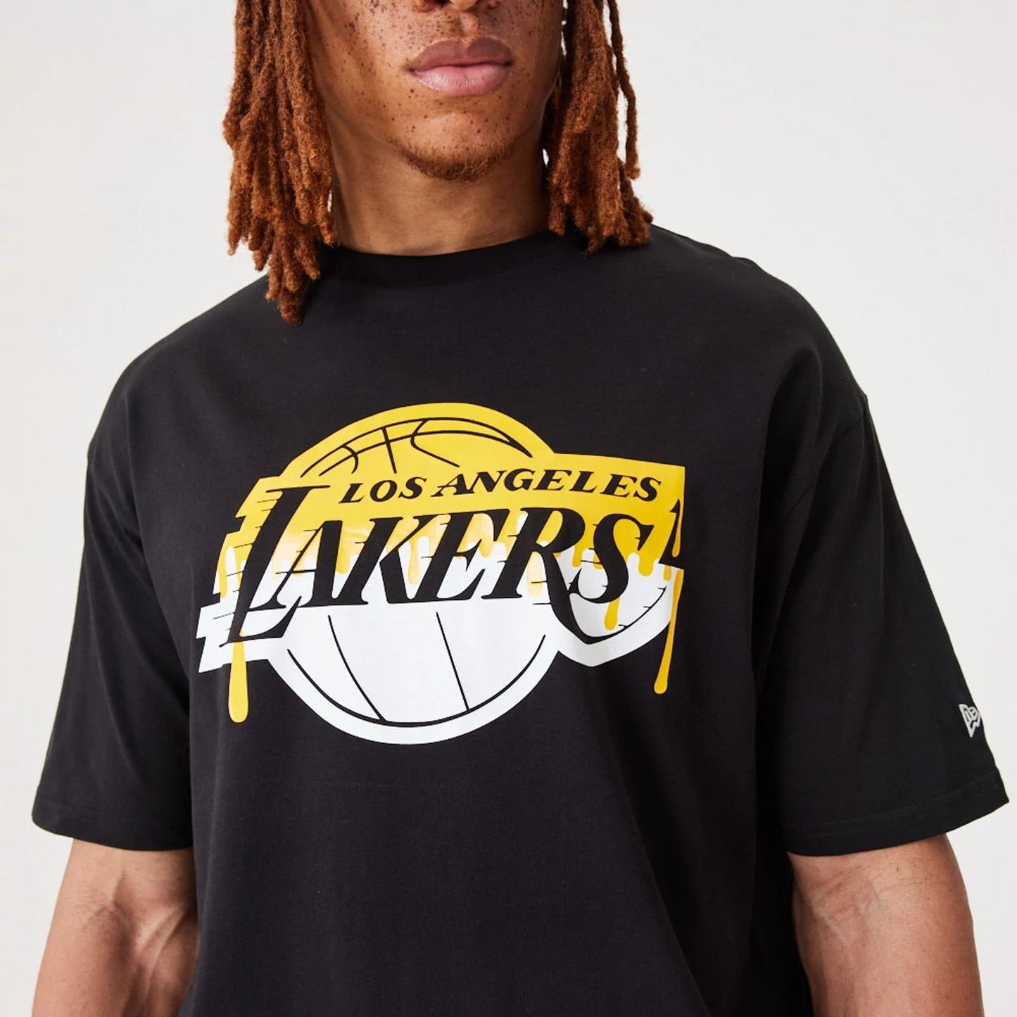 The Male model is wearing LA Lakers NBA Drip Logo Black T-Shirt 3