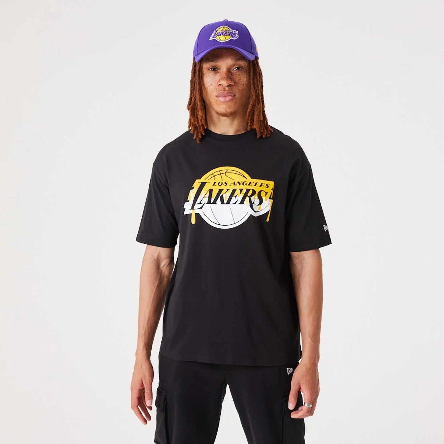 The Male model is wearing LA Lakers NBA Drip Logo Black T-Shirt 5