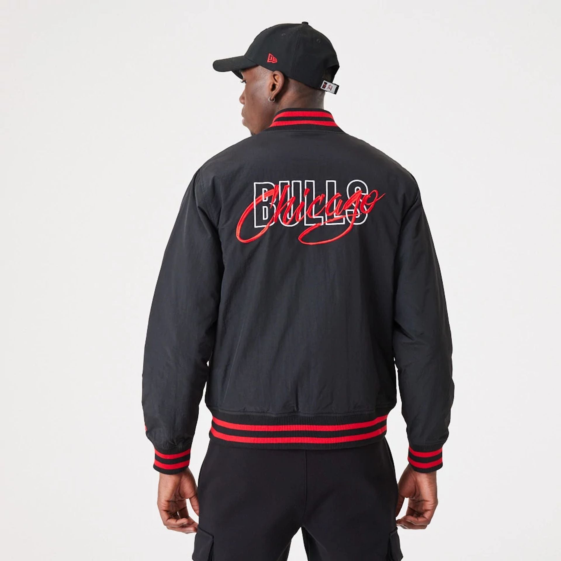 The Male model is wearing Chicago Bulls NBA Script Black Bomber Jacket 2