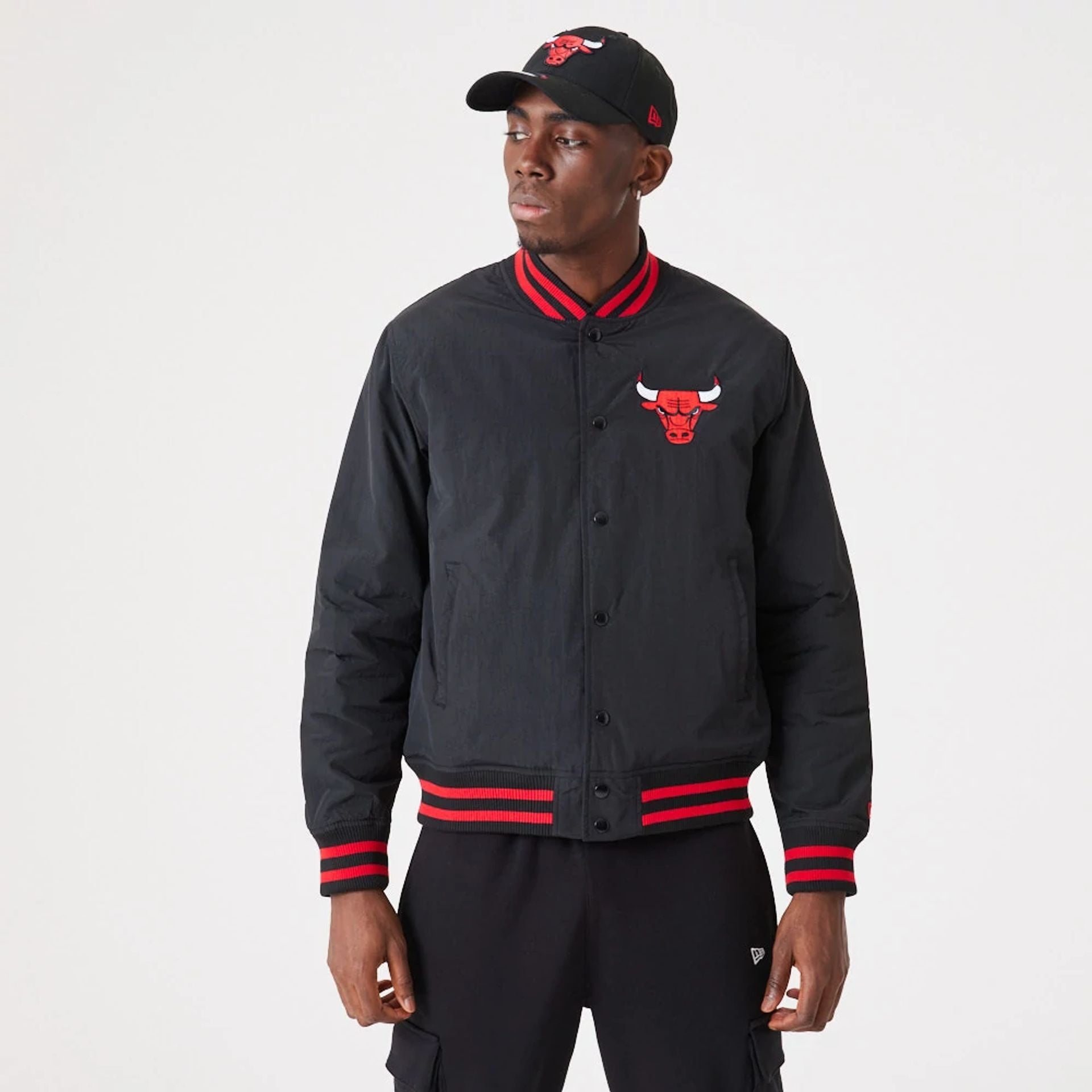 The Male model is wearing Chicago Bulls NBA Script Black Bomber Jacket 1