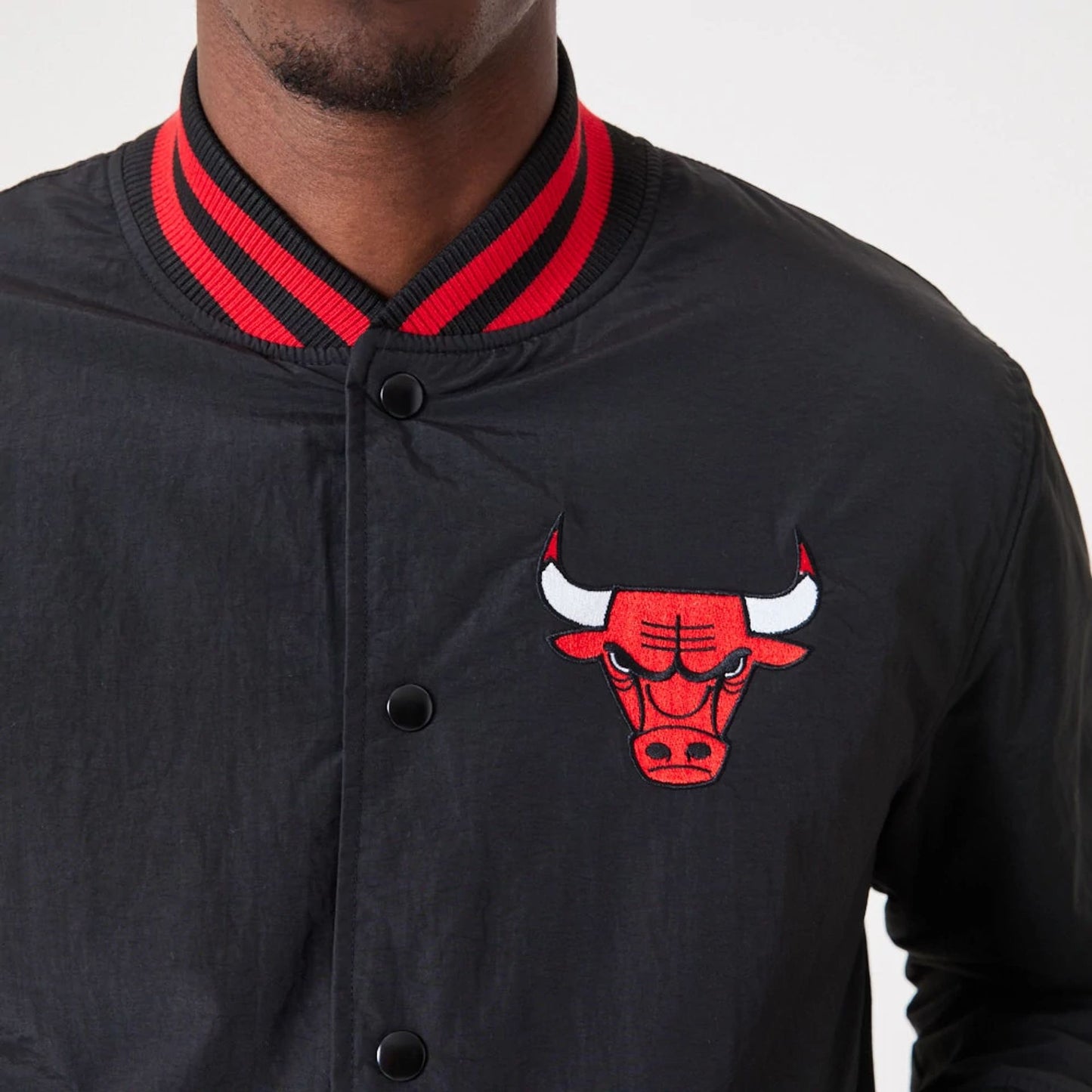 The Male model is wearing Chicago Bulls NBA Script Black Bomber Jacket 5