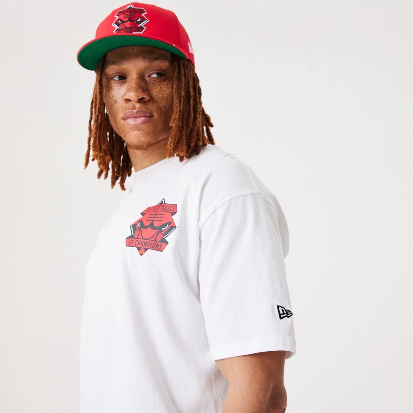 The Male model is wearing Chicago Bulls NBA Championship White Oversized T-Shirt 4