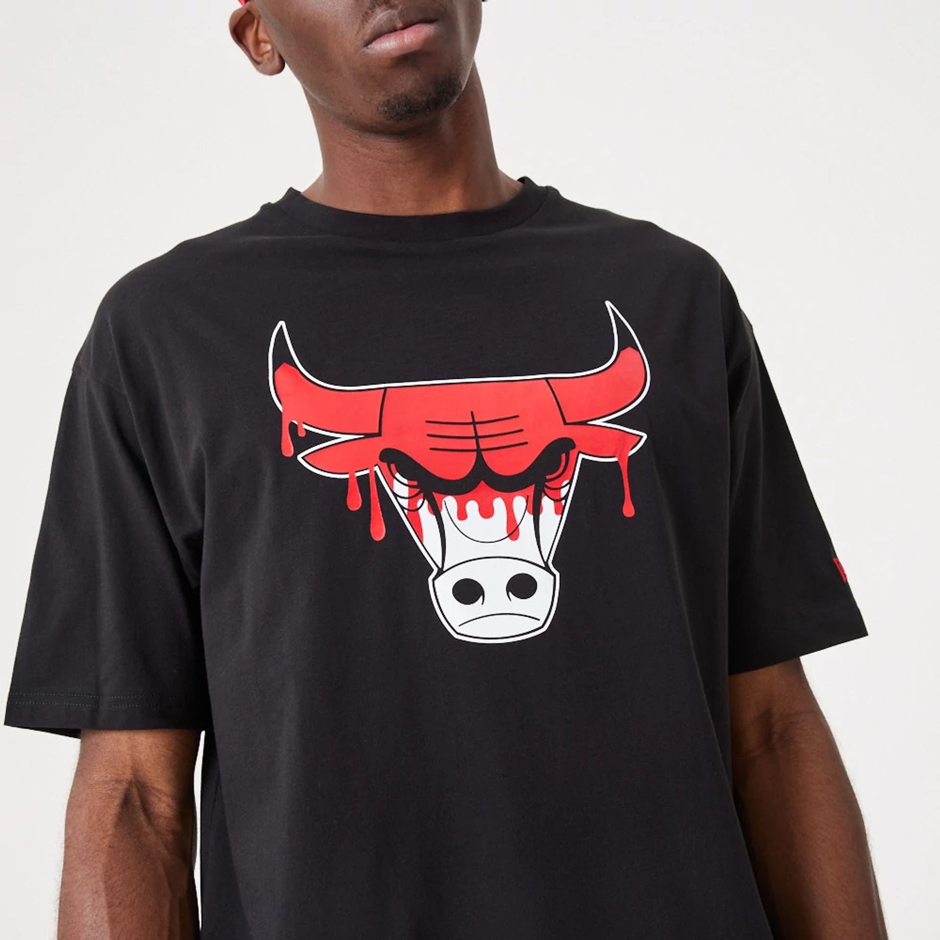 The Male model is wearing Chicago NBA Drip Logo Bulls Black T-Shirt 3