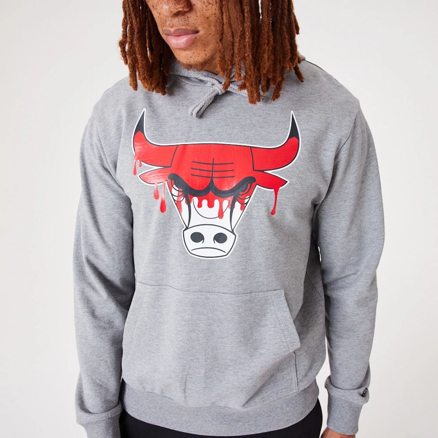 The Male model is wearing Chicago Bulls NBA Drip Logo Medium Grey Pullover Hoodie 5