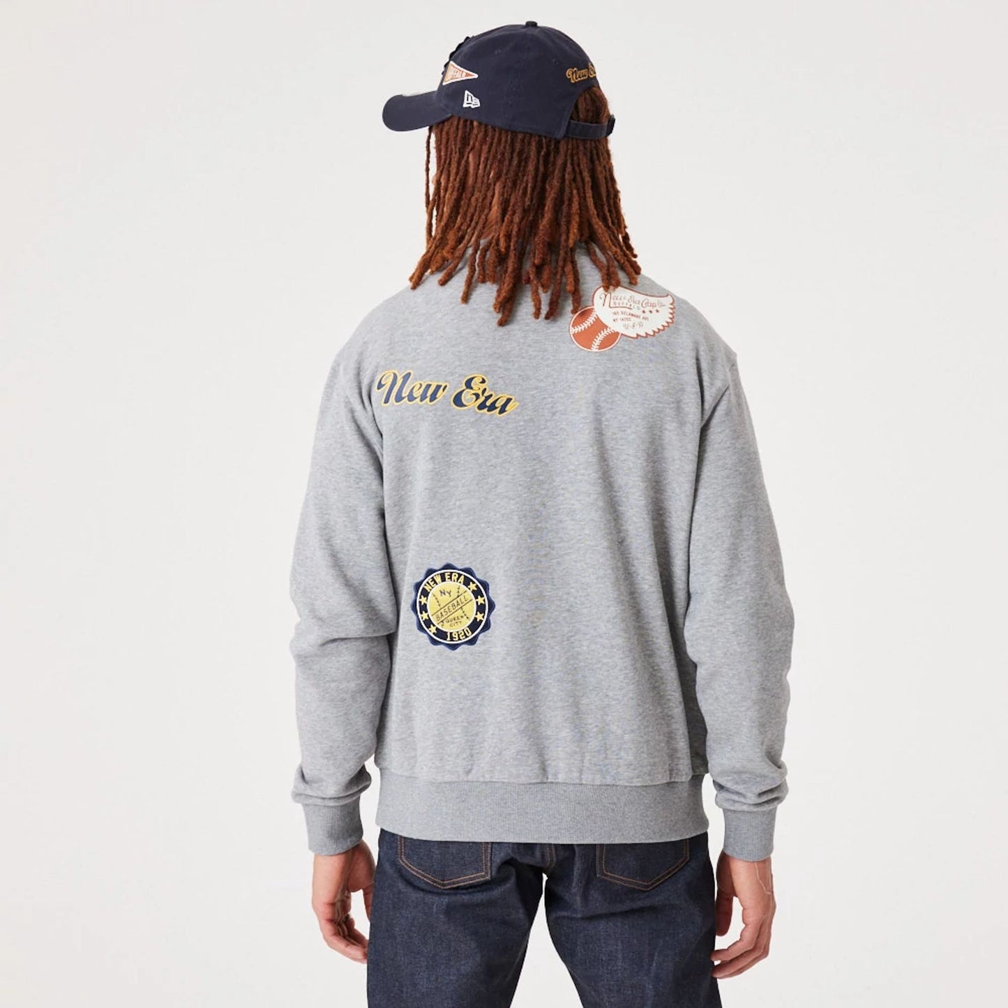 The Male model is wearing New Era Heritage Badge Medium Grey Crew Neck Sweatshirt 2