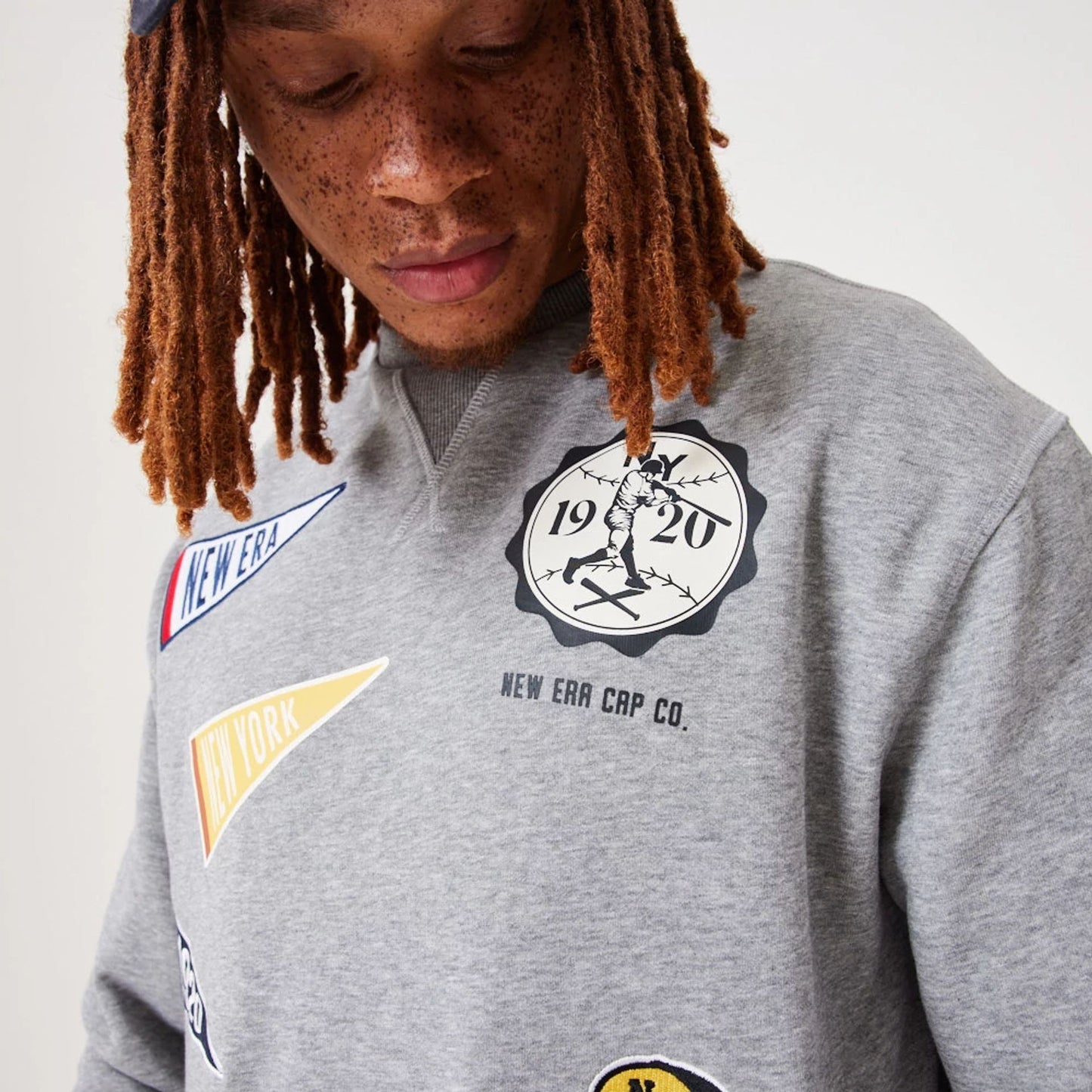 The Male model is wearing New Era Heritage Badge Medium Grey Crew Neck Sweatshirt 5