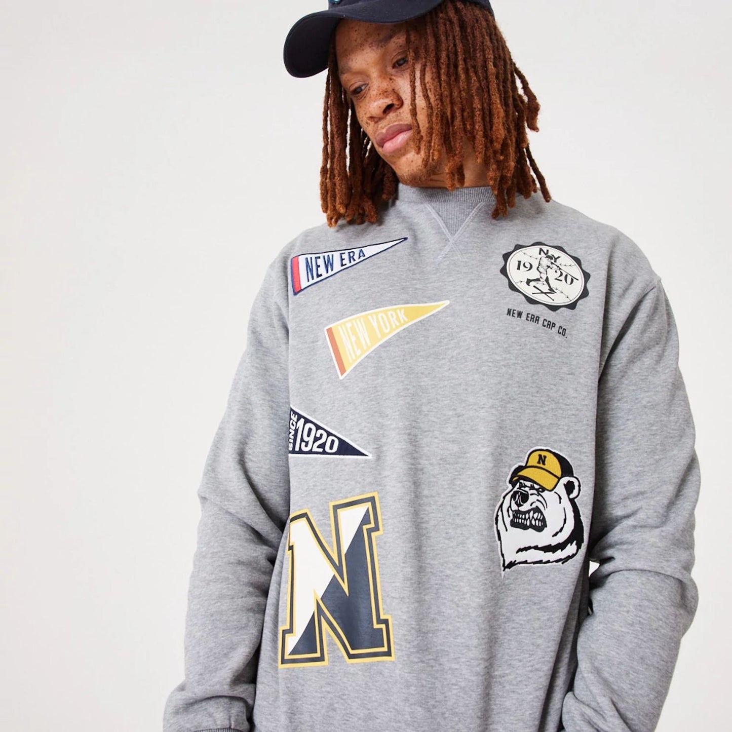 The Male model is wearing New Era Heritage Badge Medium Grey Crew Neck Sweatshirt 8