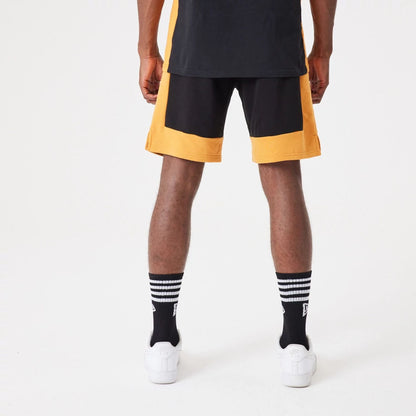 The Male model is wearing New Era Contemporary Black Oversized Shorts 3