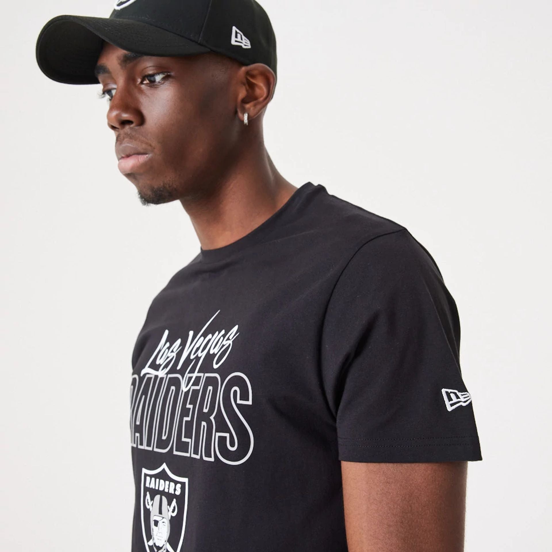 The Male model is wearing Las Vegas Raiders NFL Script Black T-Shirt 2