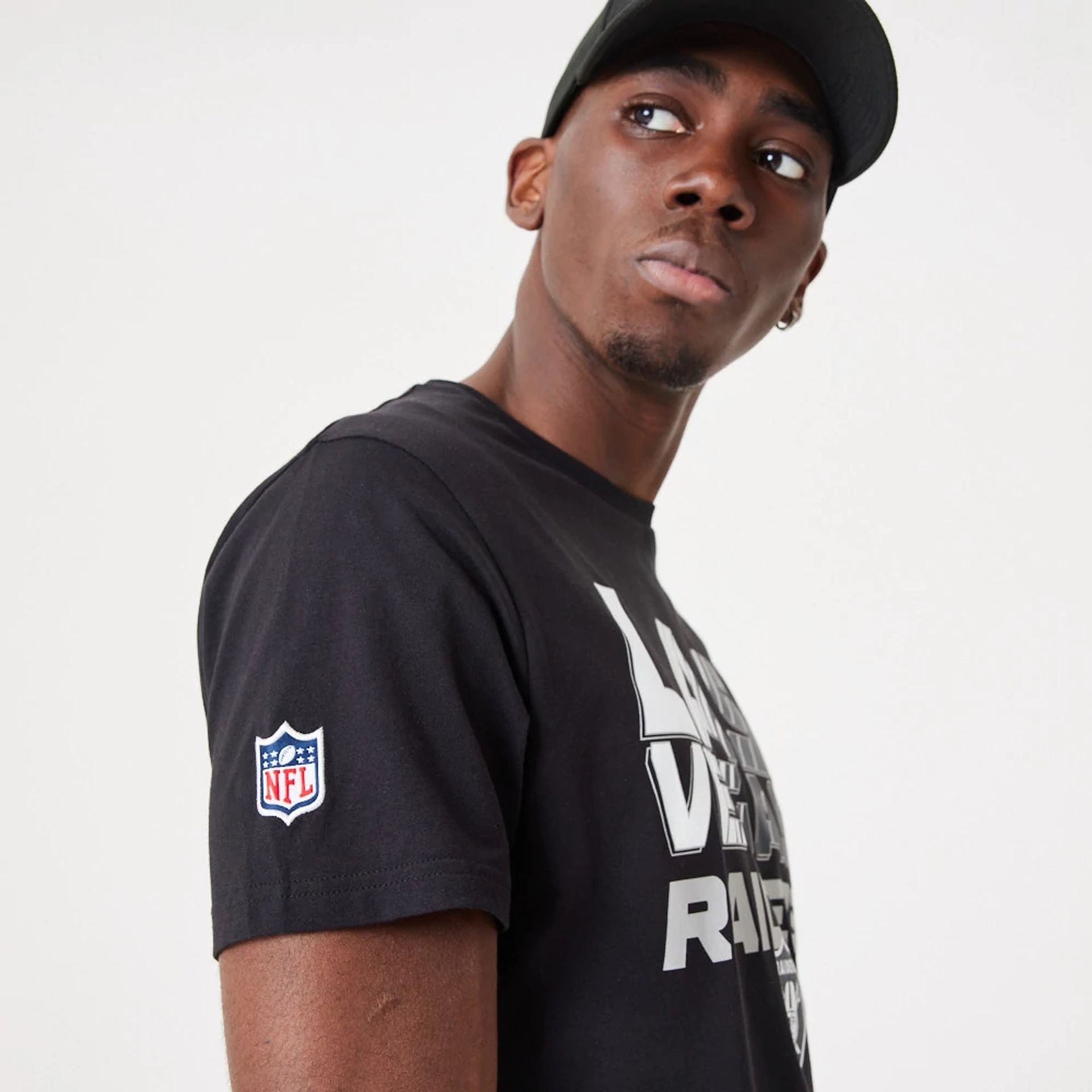 The Male model is wearing Las Vegas Raiders NFL Gradient Wordmark Black T-Shirt 3