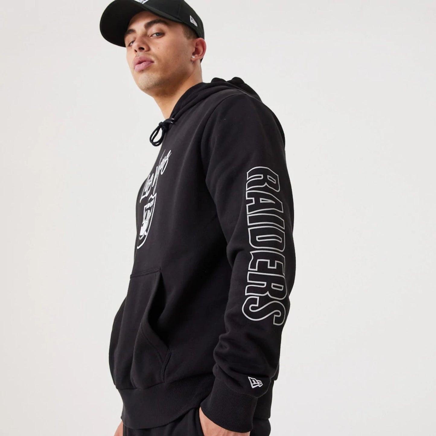 The Male model is wearing Las Vegas Raiders NFL Script Black Pullover Hoodie 1