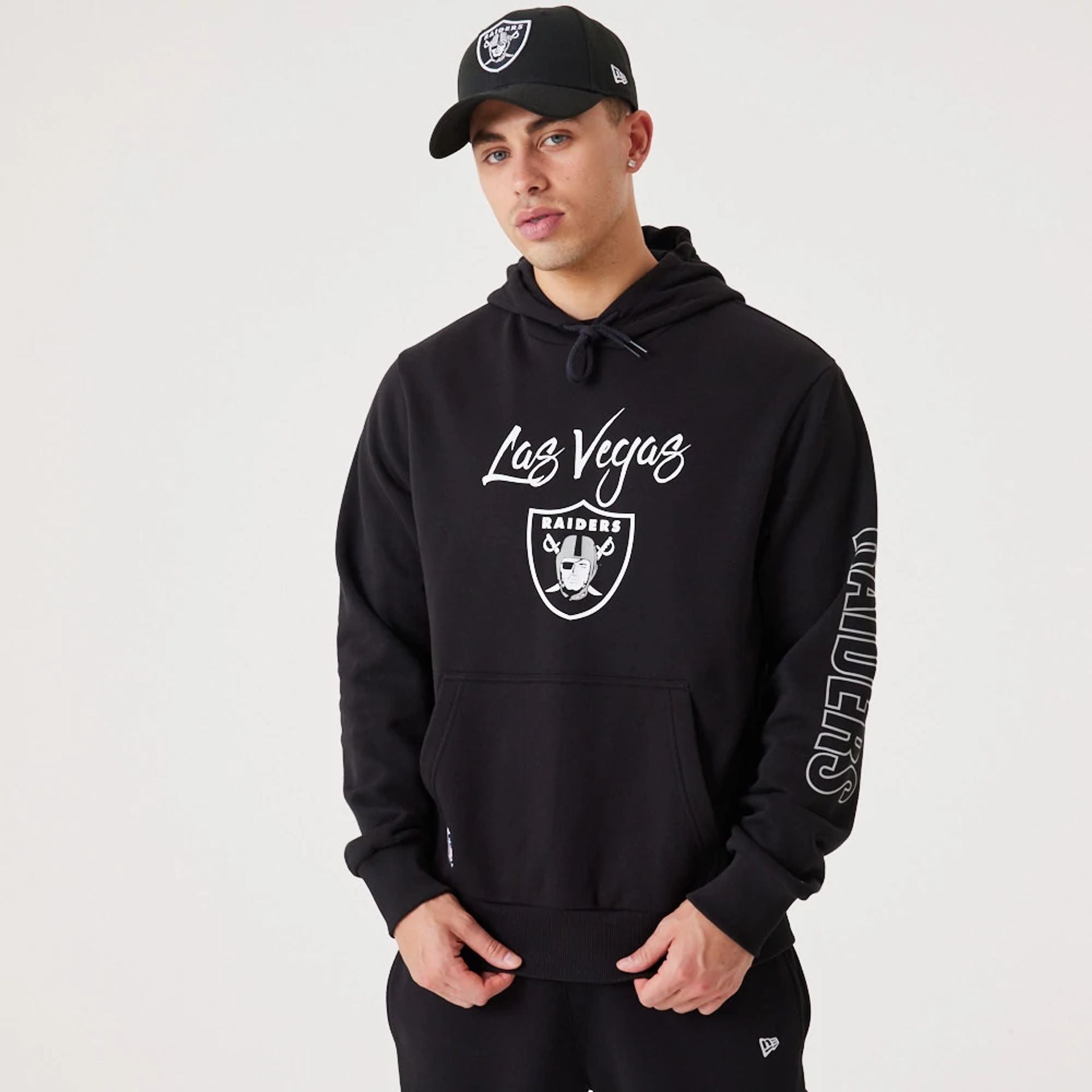 The Male model is wearing Las Vegas Raiders NFL Script Black Pullover Hoodie 2