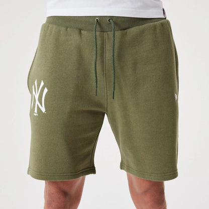 The Male model is wearing New York Yankees MLB League Essential Medium Green Shorts 5