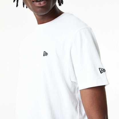 The Male model is wearing New Era Essential Plain White T-Shirt 5