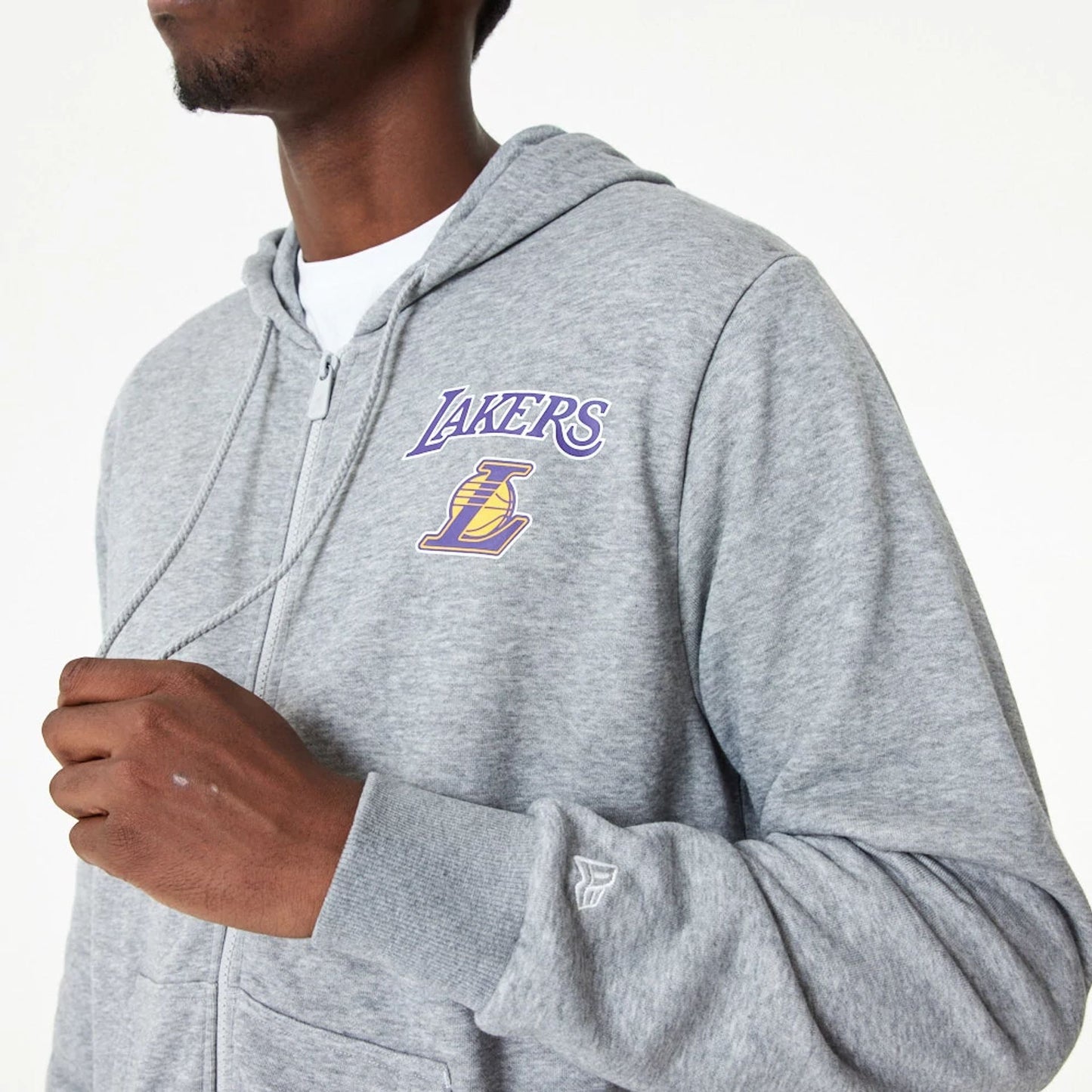 The Male model is wearing LA Lakers NBA Essentials Medium Grey Full Zip Hoodie 3