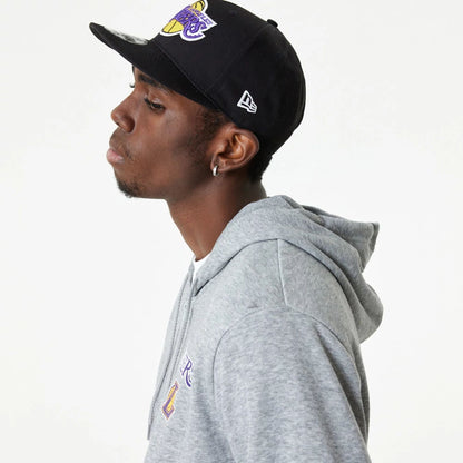 The Male model is wearing LA Lakers NBA Essentials Medium Grey Full Zip Hoodie 4