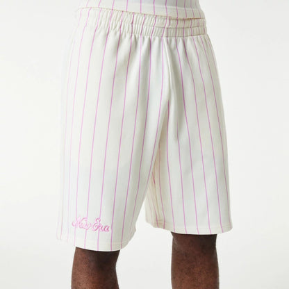 The Male model is wearing New Era Pink Pinstripe White Shorts 6