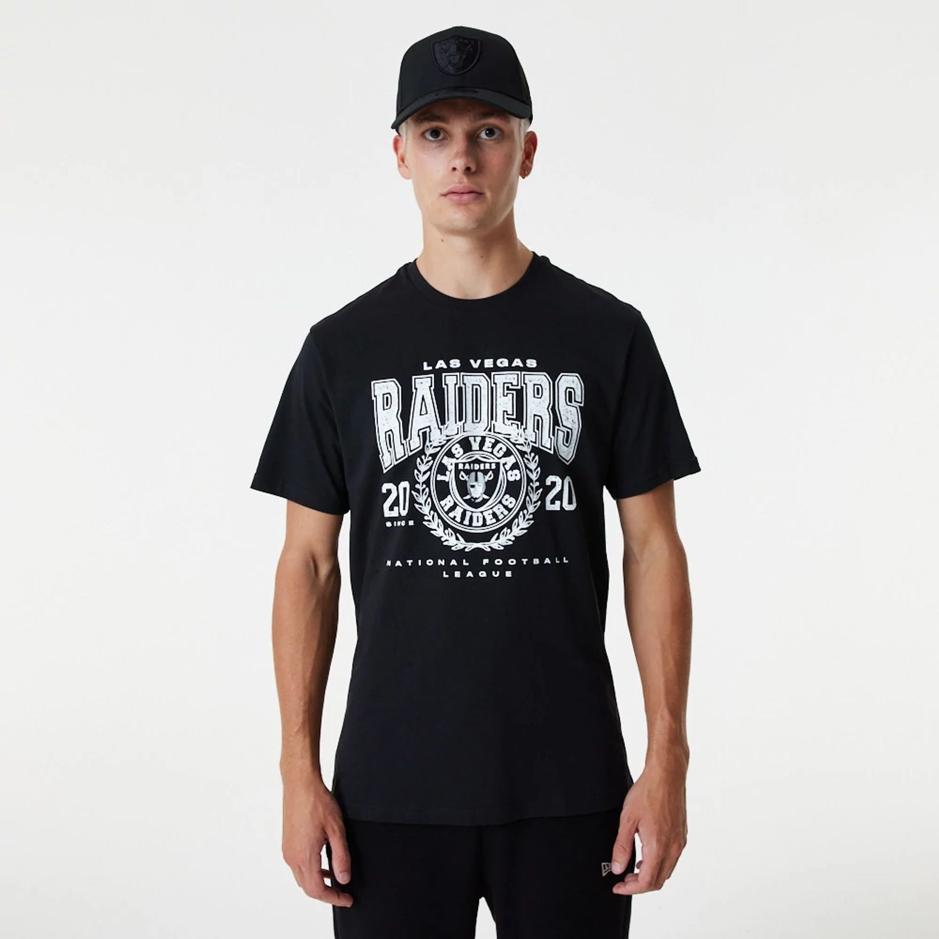 The Male model is wearing NFL Team Graphic Las Vegas Raiders Black T-Shirt 2