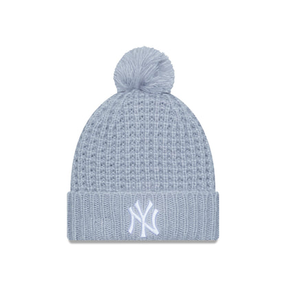 This is a New York Yankees Cosy Pom Womens Blue Beanie 1