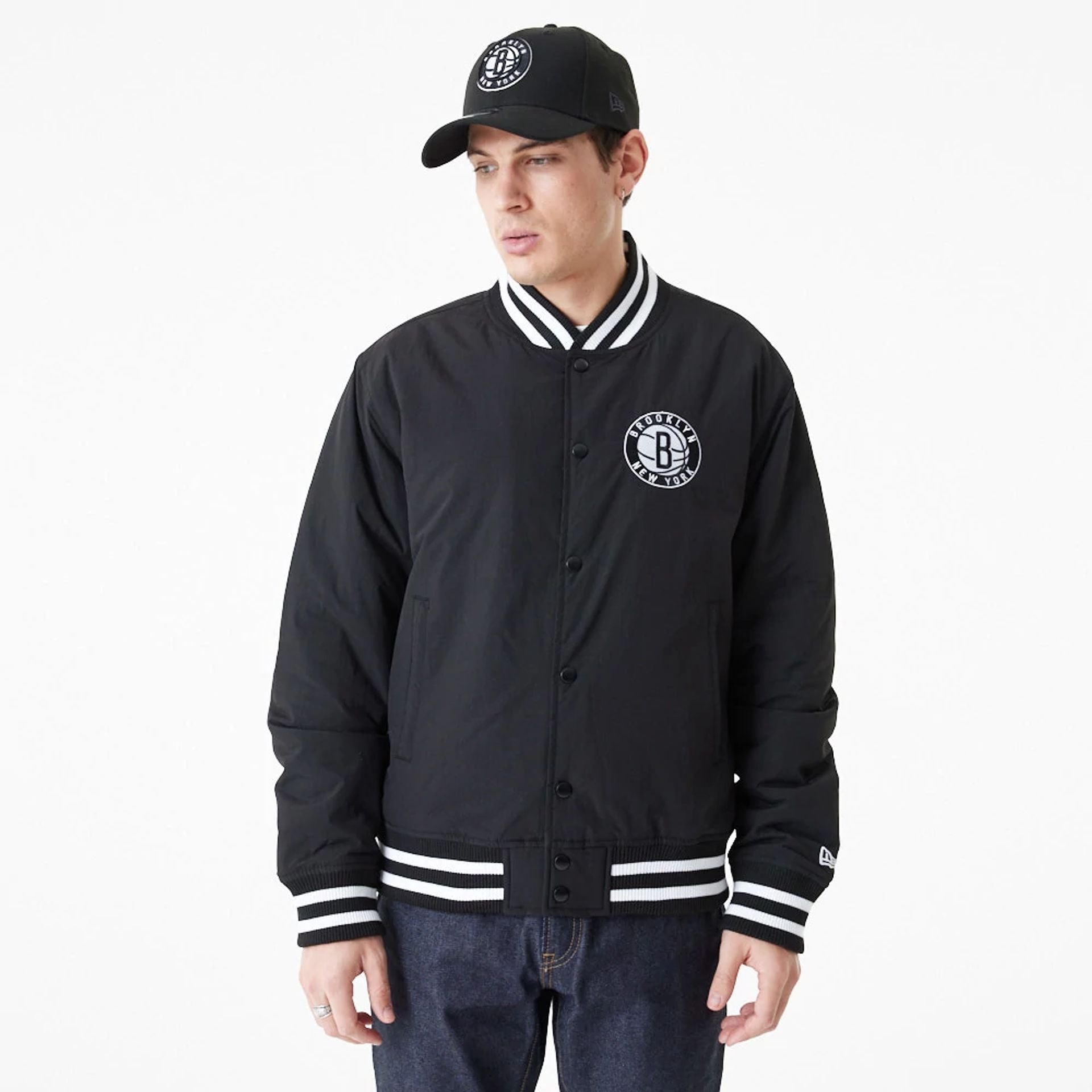 The Male model is wearing Brooklyn Nets Team Script Black Bomber Jacket 1