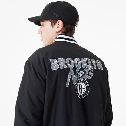 The Male model is wearing Brooklyn Nets Team Script Black Bomber Jacket 6