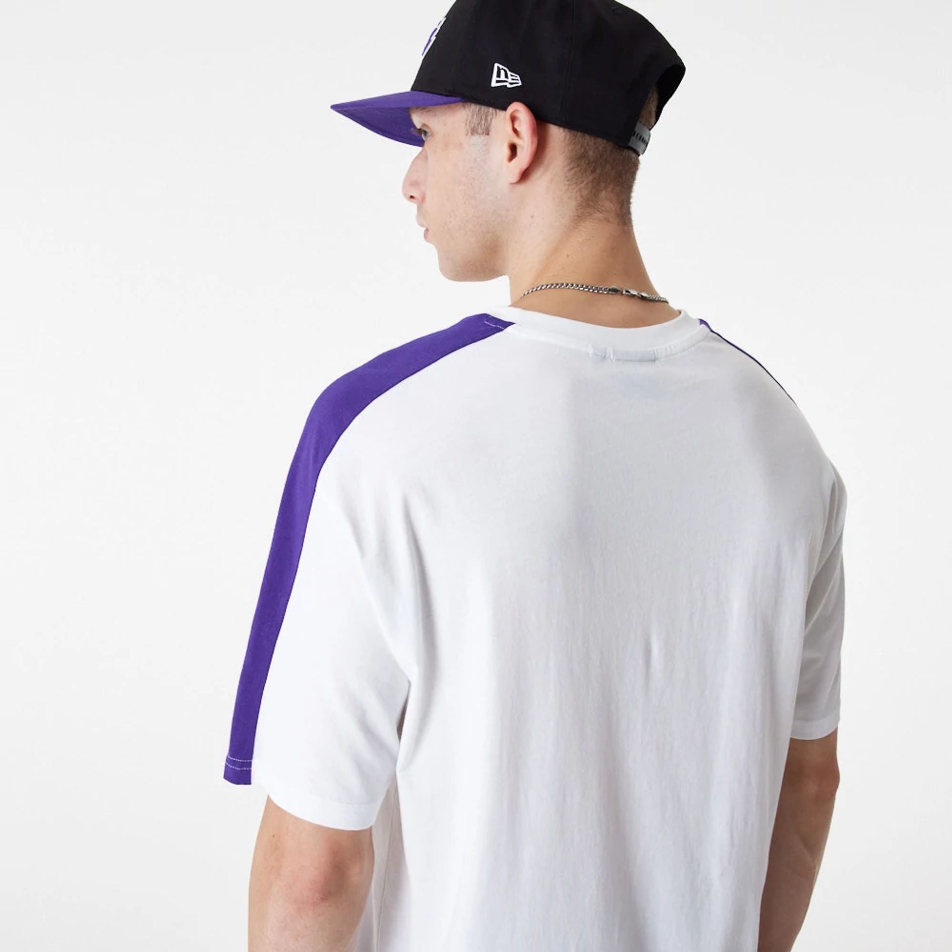 The Male model is wearing LA Lakers NBA Colour Block White Oversized T-Shirt 5