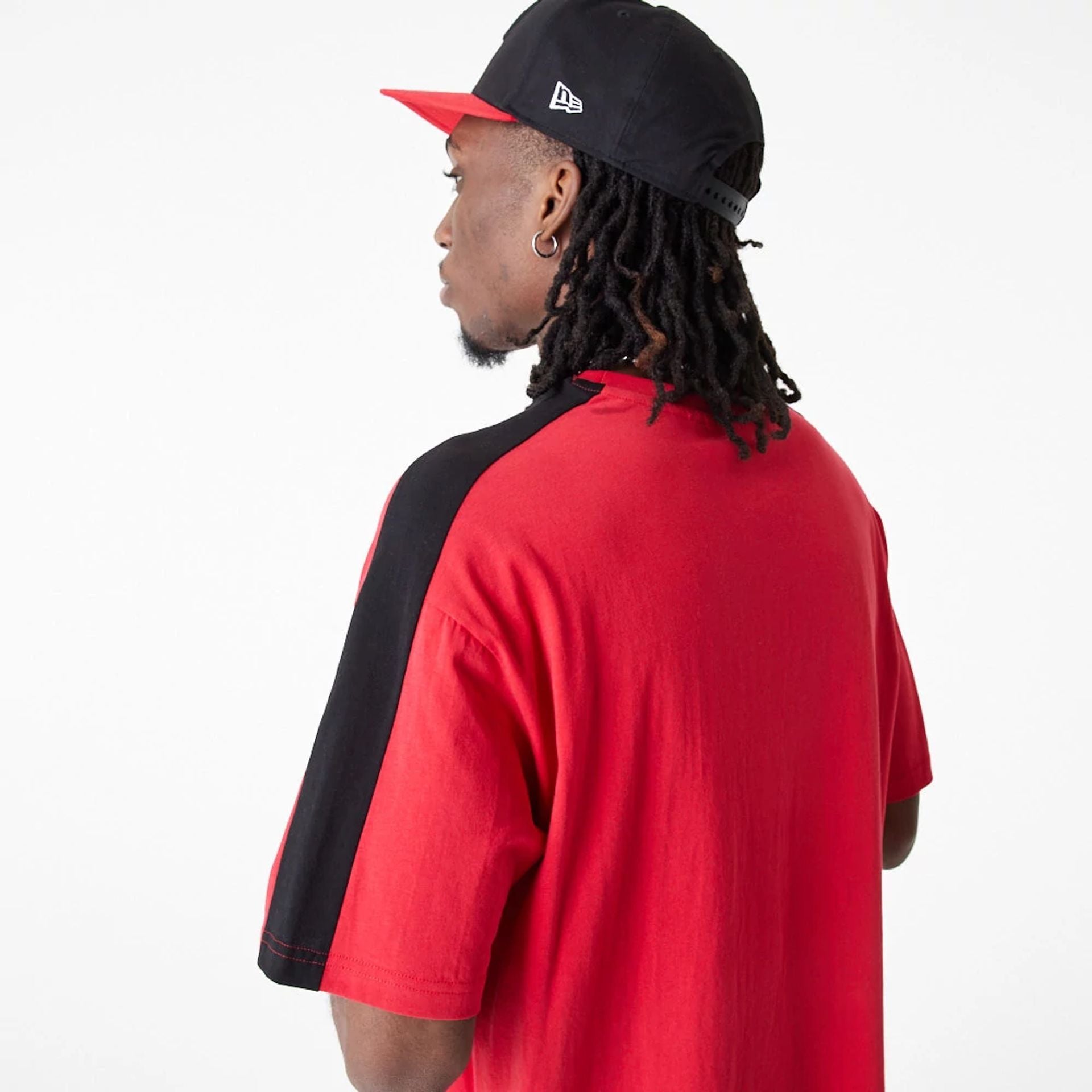 The Male model is wearing Chicago Bulls NBA Colour Block Red Oversized T-Shirt 7