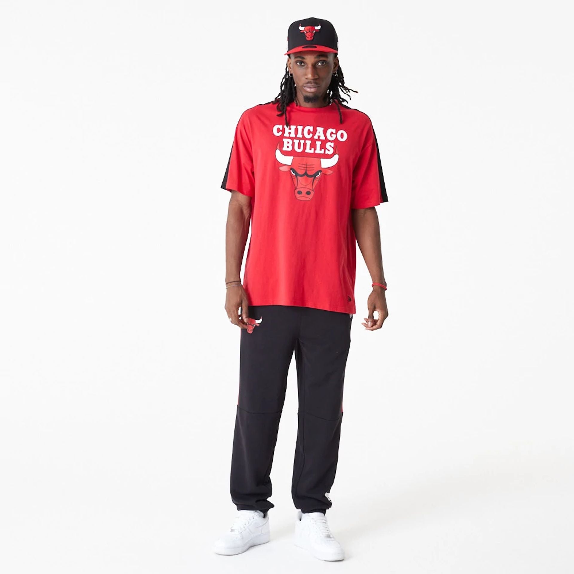 The Male model is wearing Chicago Bulls NBA Colour Block Red Oversized T-Shirt 5