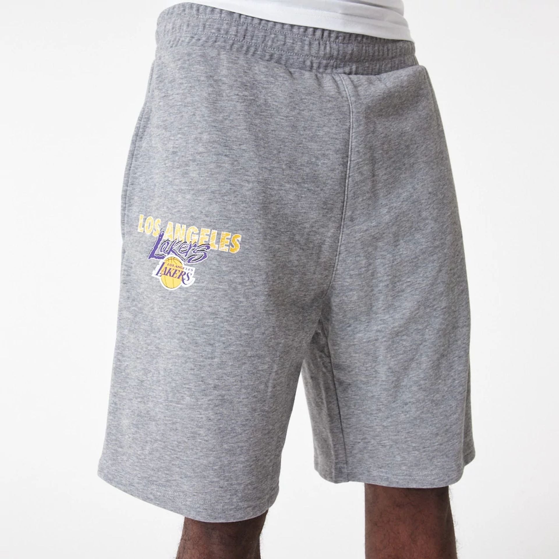 The Male model is wearing LA Lakers Team Script Grey Shorts 1