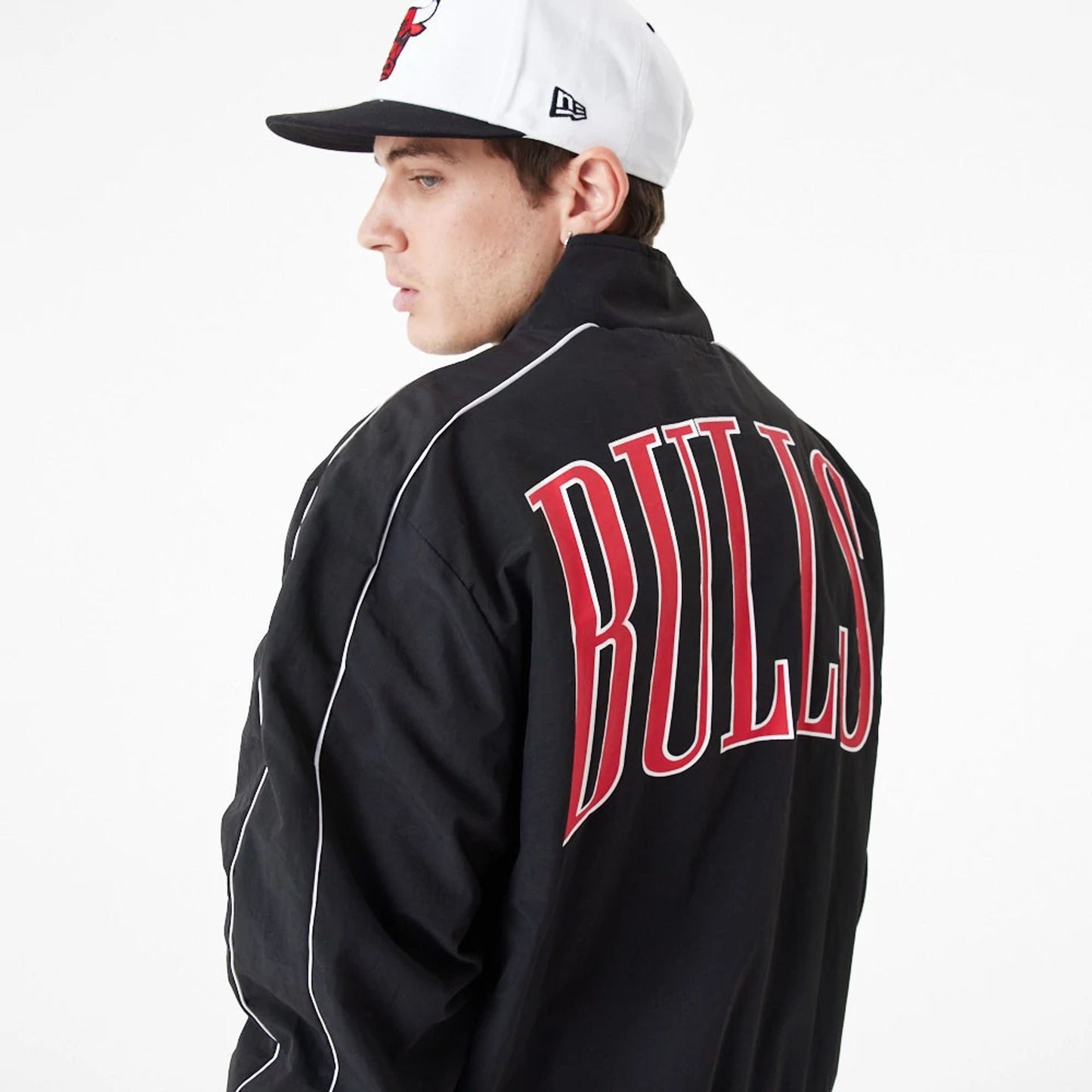 The Male model is wearing Chicago Bulls NBA Lifestyle Black Track Jacket 6