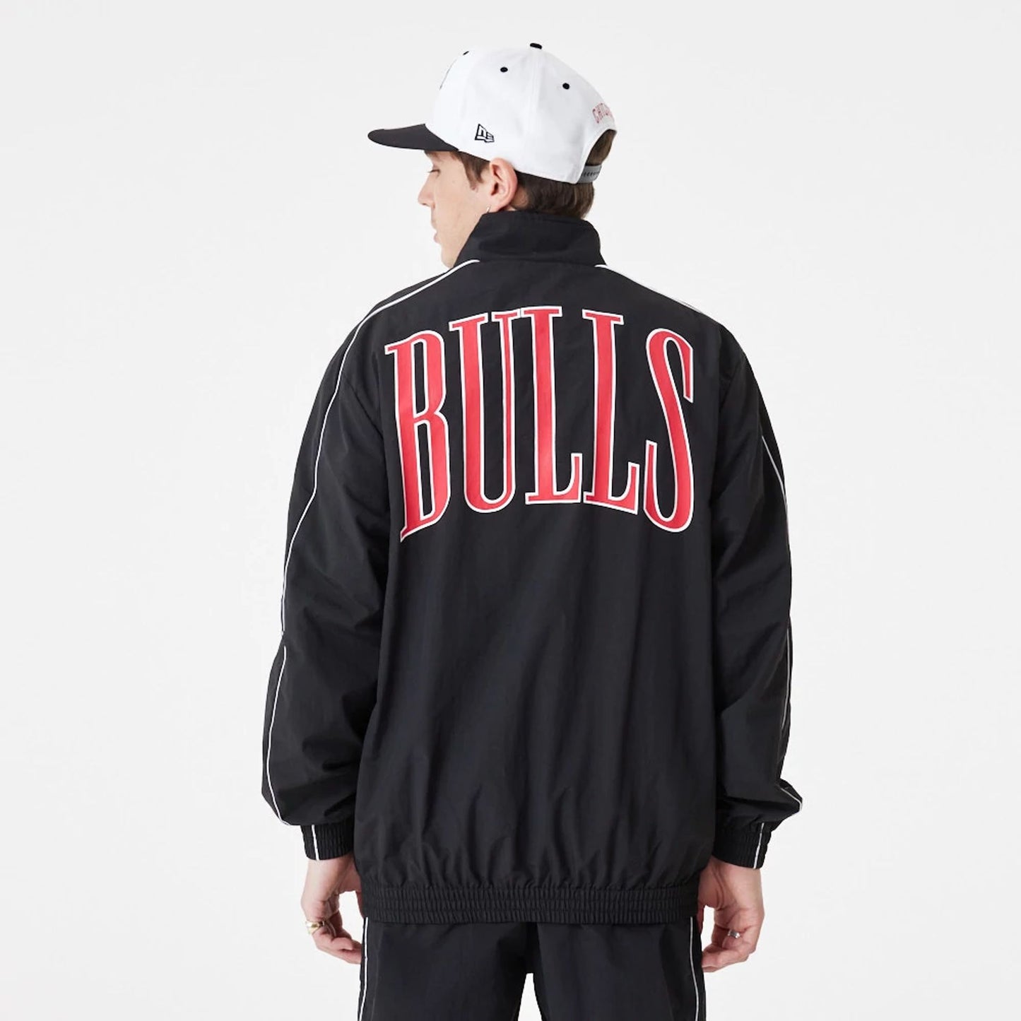 The Male model is wearing Chicago Bulls NBA Lifestyle Black Track Jacket 2