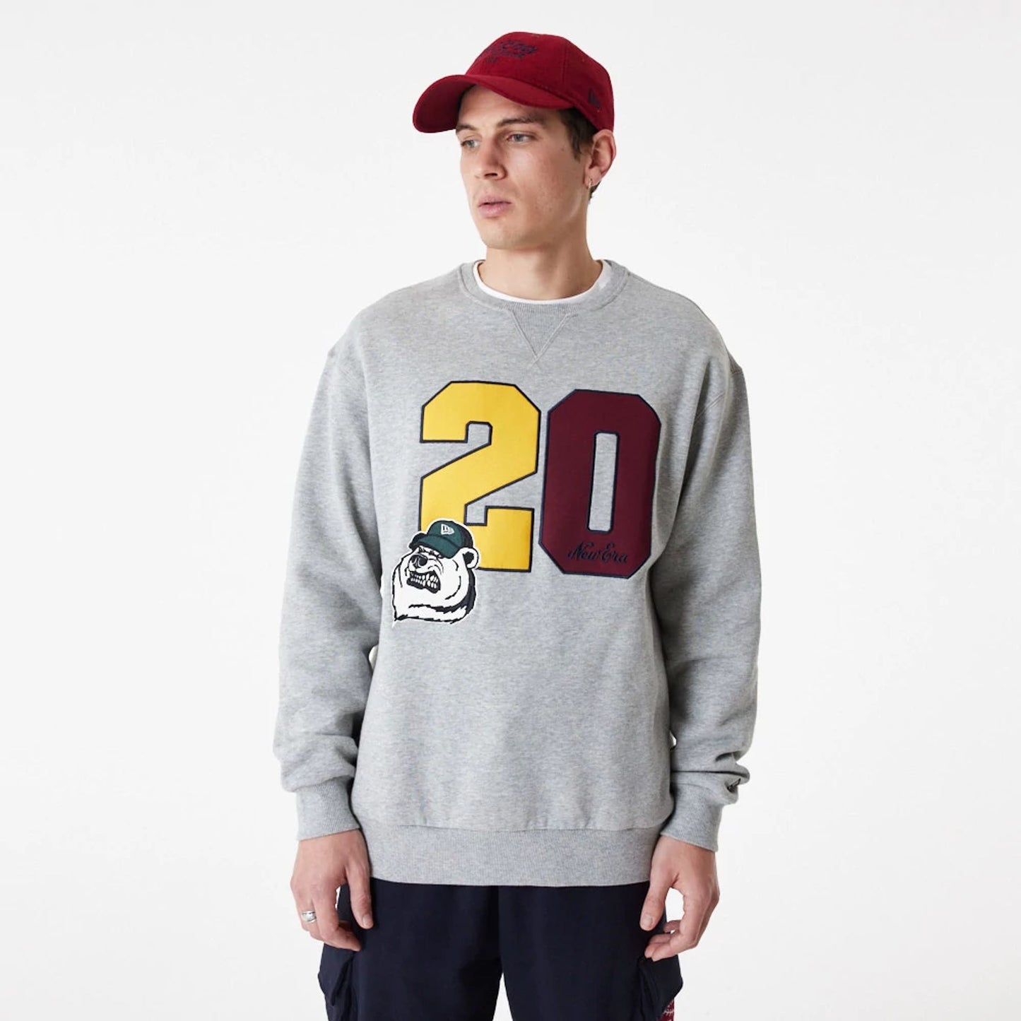 The Male model is wearing New Era Lifestyle Grey Crew Neck Sweatshirt 3