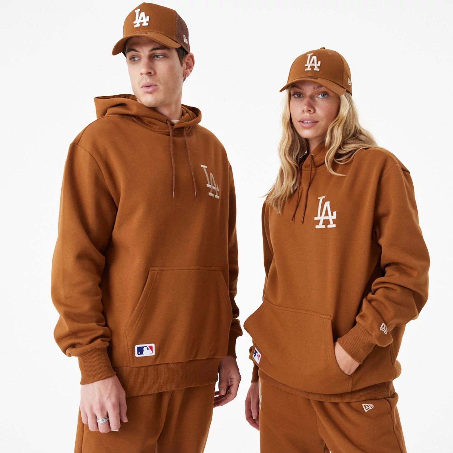 The Male model is wearing LA Dodgers League Essential Oversized Brown Hoodie 1