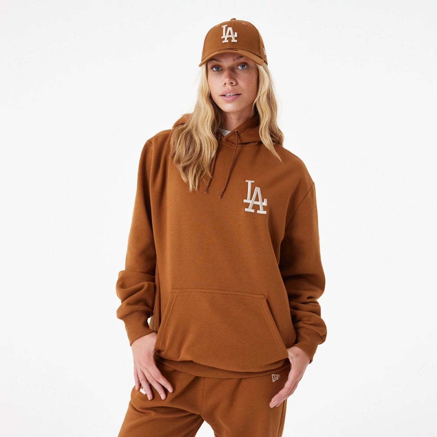 The Male model is wearing LA Dodgers League Essential Oversized Brown Hoodie 3