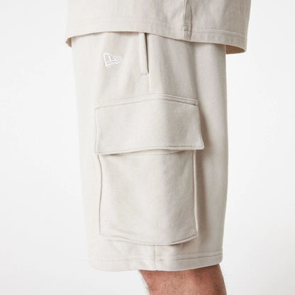 The Male model is wearing New Era Essential Stone Shorts 3