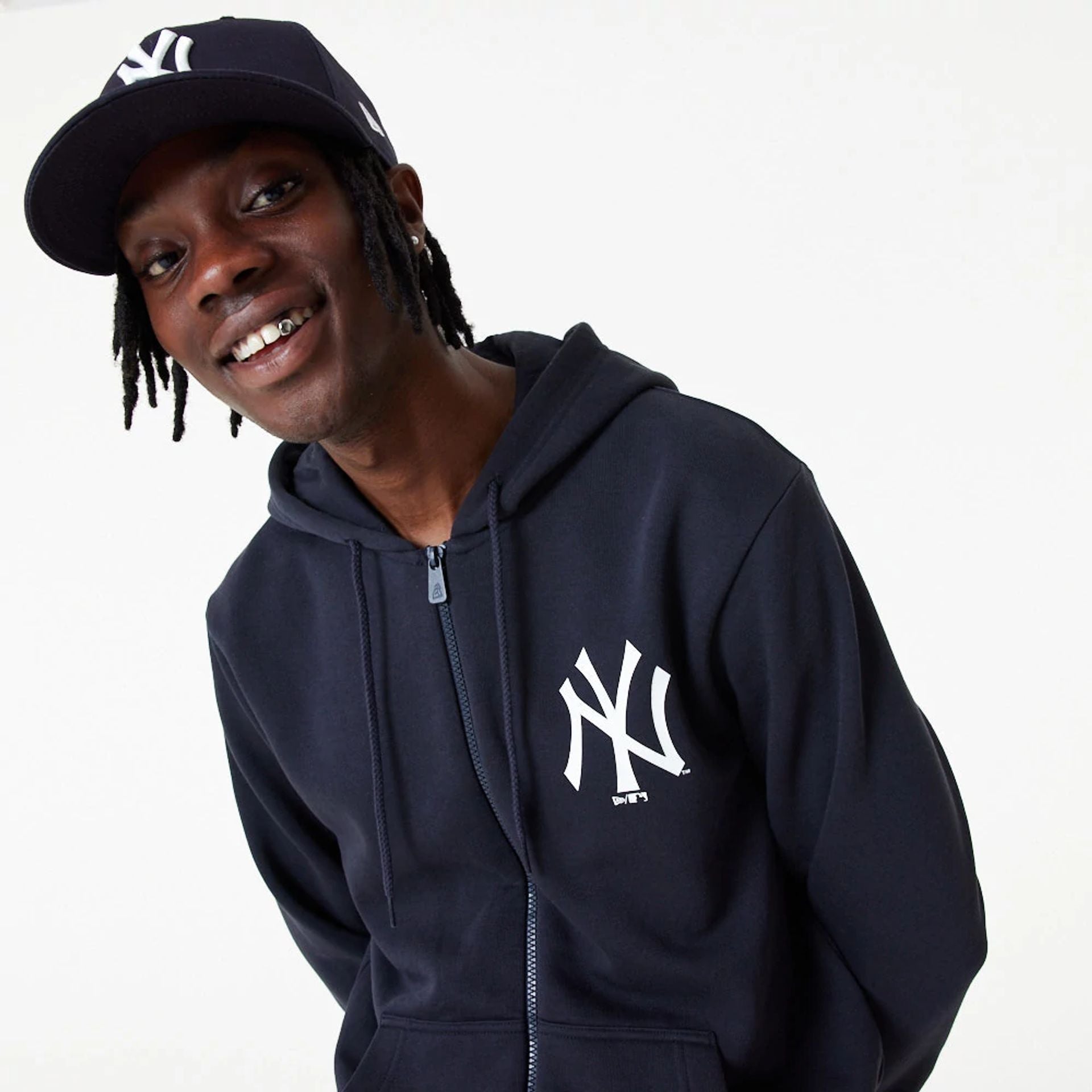 The Male model is wearing New York Yankees MLB Essential Navy Full Zip Hoodie 1