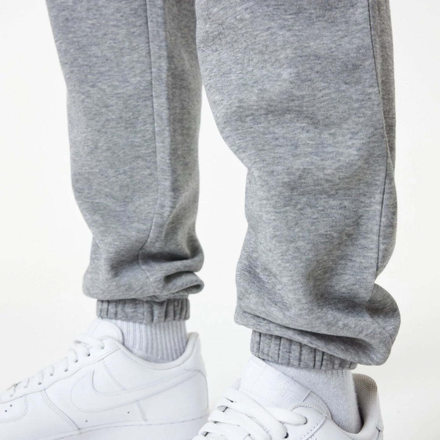 The Male model is wearing New York Yankees MLB Essential Grey Joggers 3