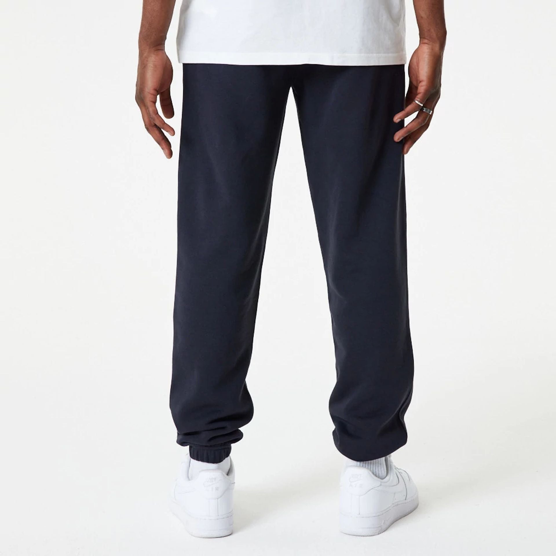 The Male model is wearing New York Yankees MLB Essential Navy Joggers 7