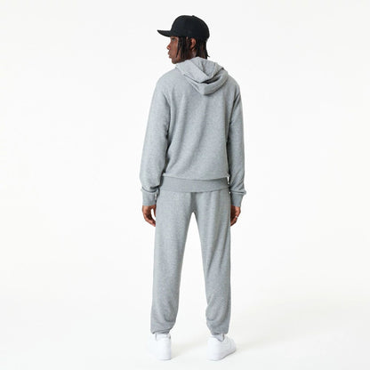 The Male model is wearing New Era Essential Grey Pullover Hoodie 10