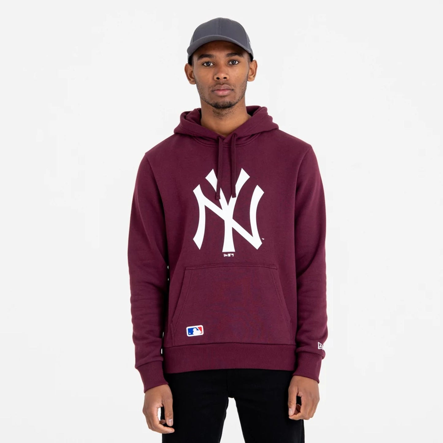 The Male model is wearing New York Yankees MLB Regular Dark Purple Pullover Hoodie 1