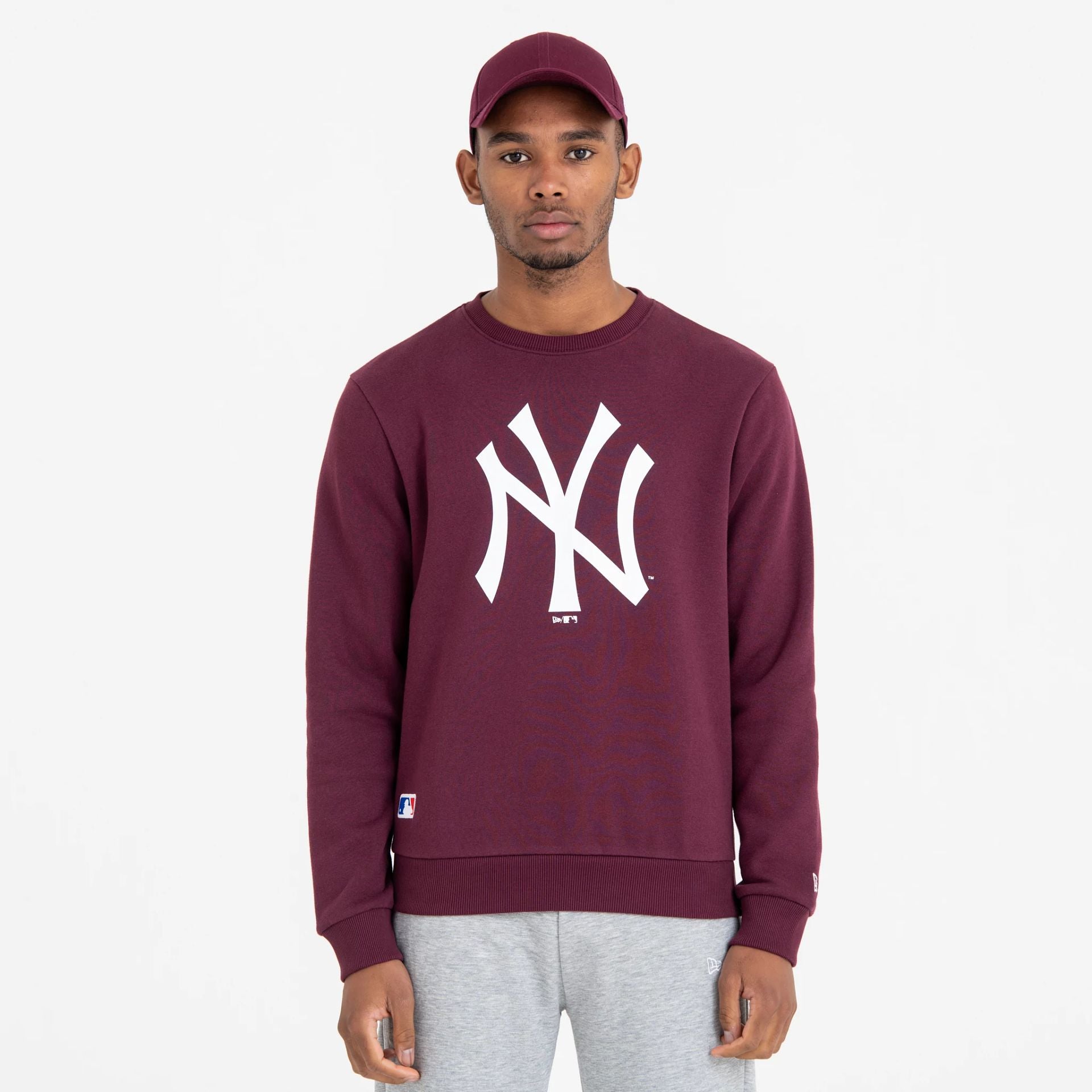 The Male model is wearing New York Yankees MLB Regular Dark Purple Crew Neck Sweatshirt 1