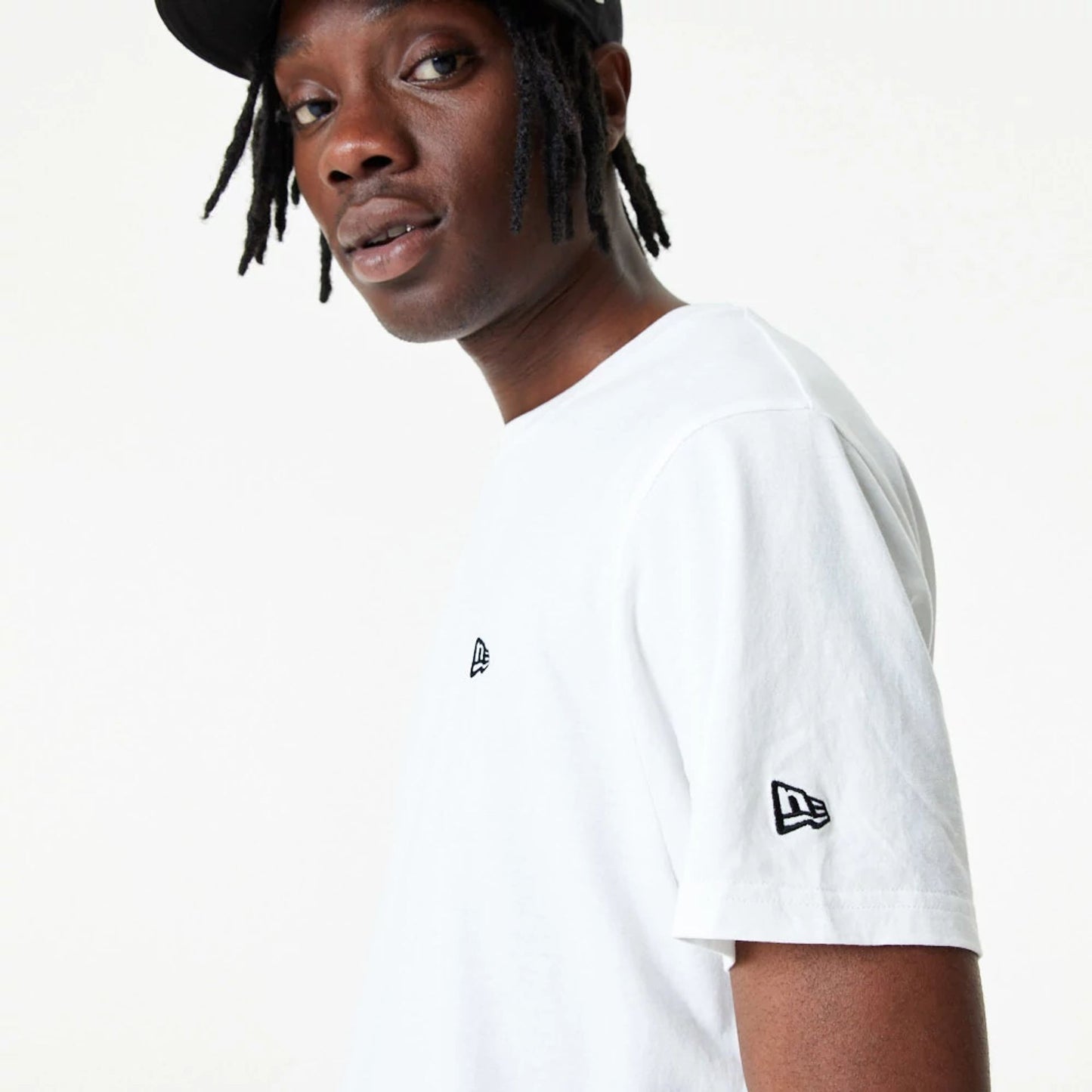 The Male model is wearing New Era Essential White T-Shirt 3