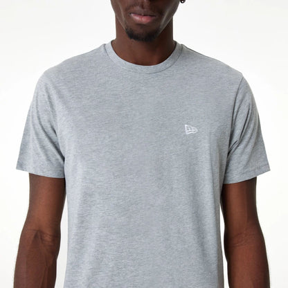 The Male model is wearing New Era Essential Grey T-Shirt 2