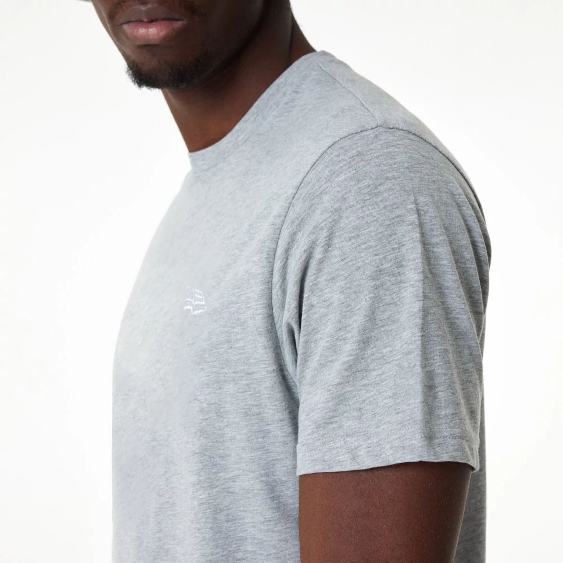 The Male model is wearing New Era Essential Grey T-Shirt 3