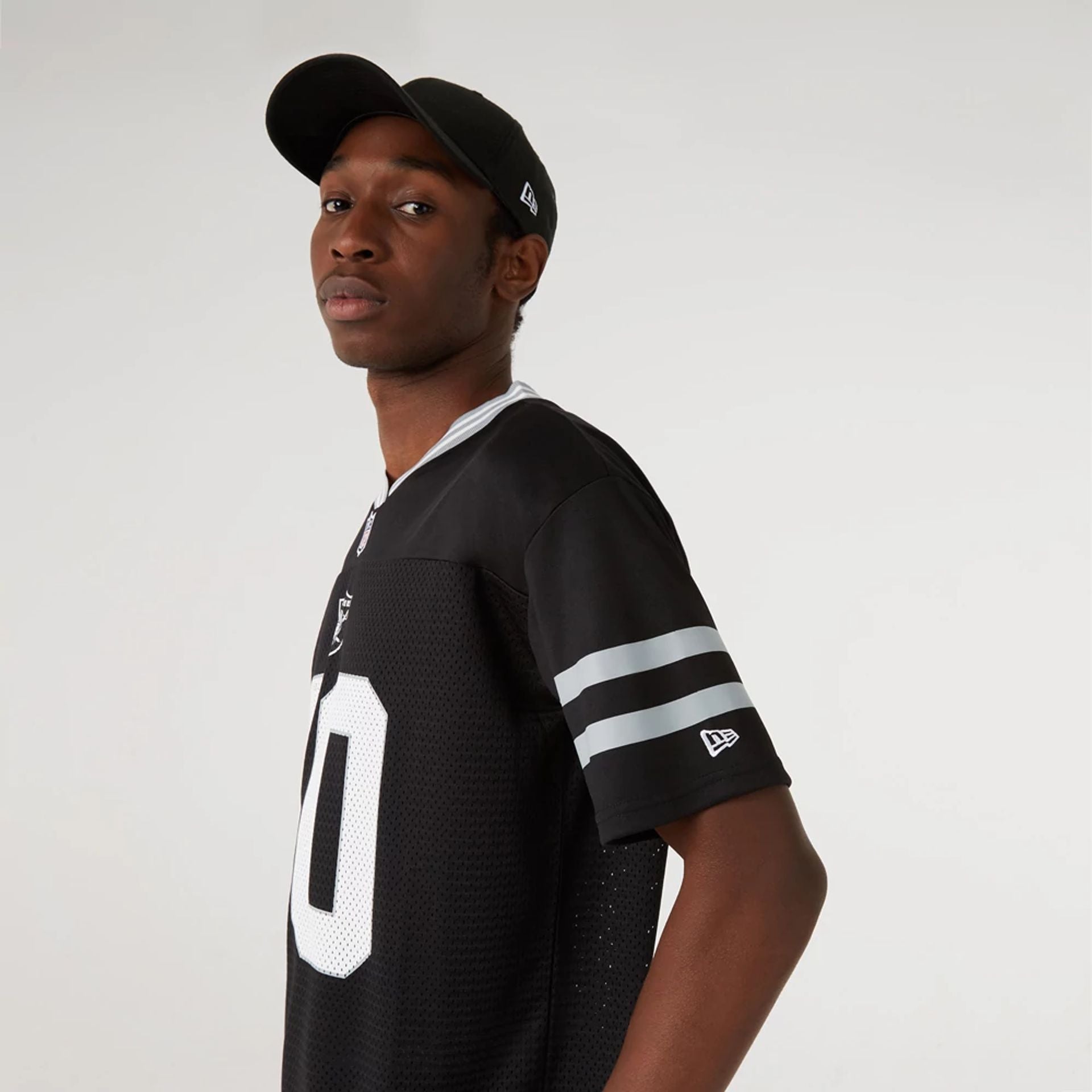 The Male model is wearing Las Vegas Raiders NFL Black Mesh T-Shirt 2