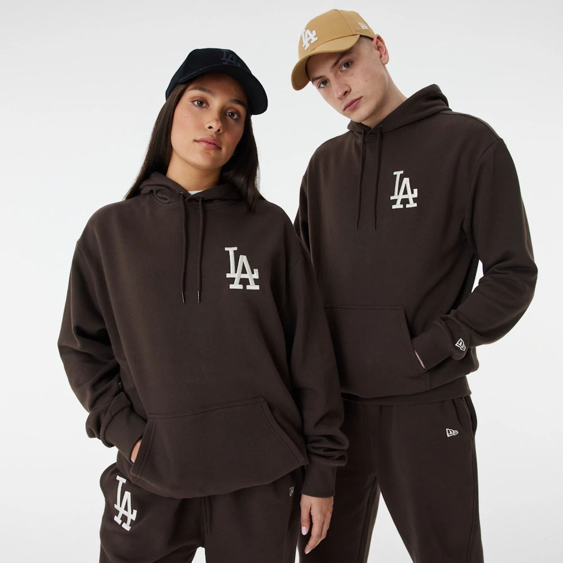 The Male model is wearing LA Dodgers League Essential Brown Oversized Hoodie 1