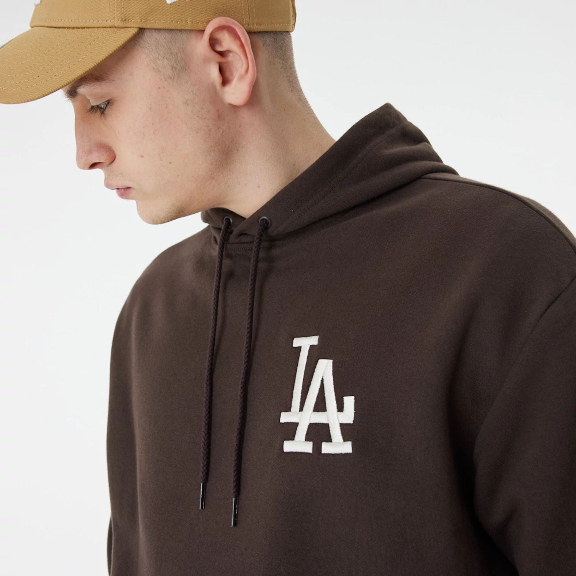 The Male model is wearing LA Dodgers League Essential Brown Oversized Hoodie 6