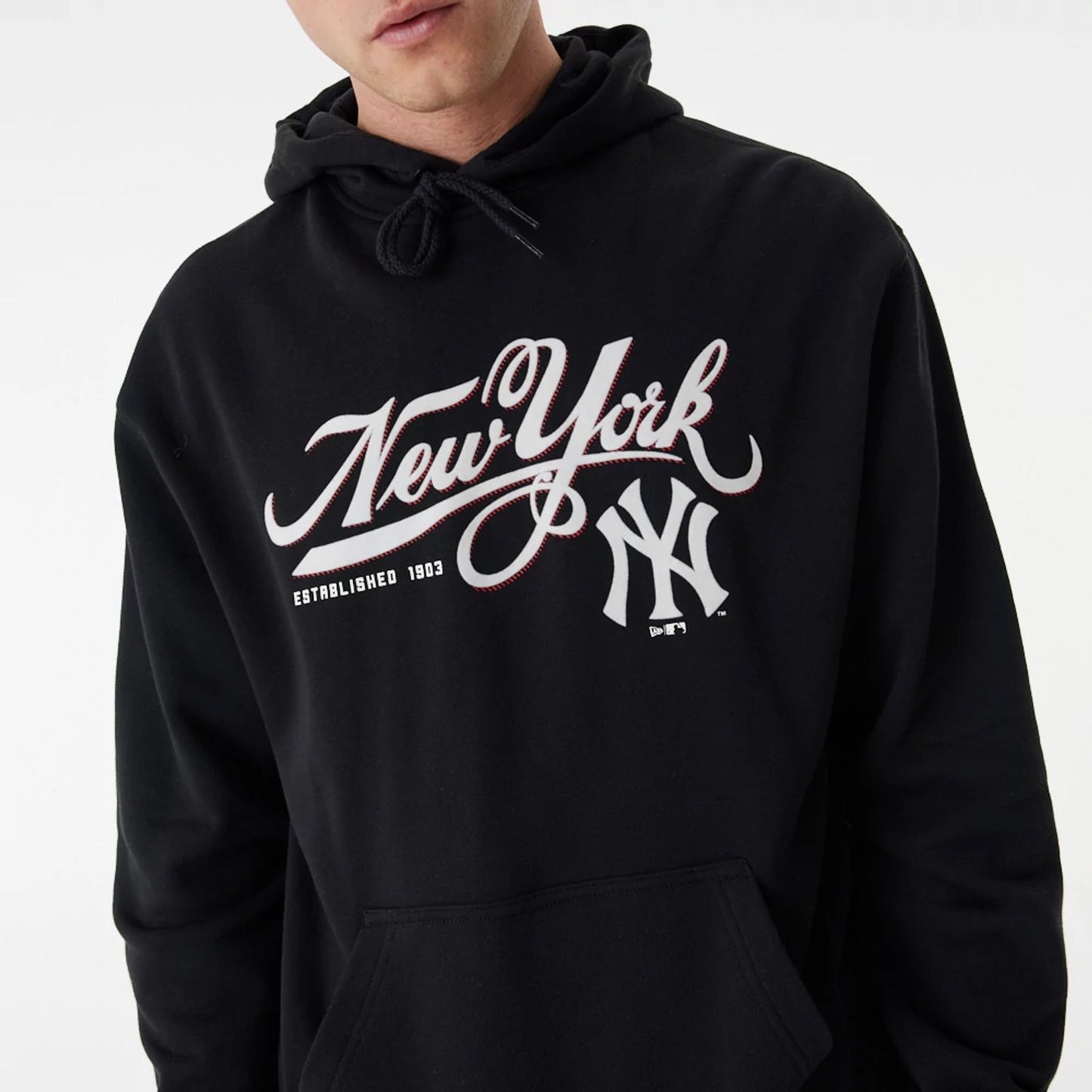 The Male model is wearing New York Yankees MLB Team Retro Graphic Black Oversized Hoodie 1