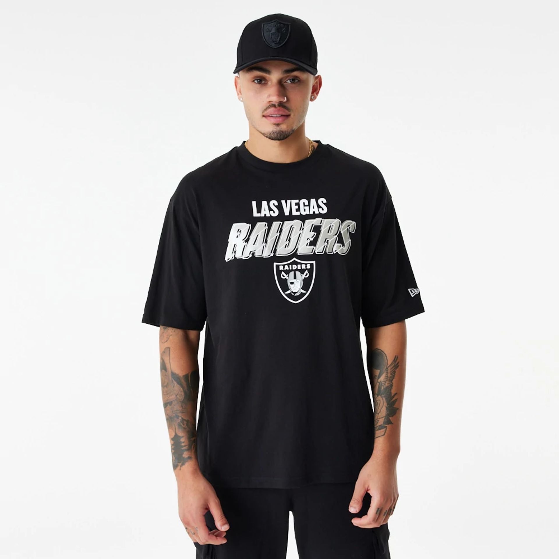 The Male model is wearing Las Vegas Raiders NFL Script Graphic Black Oversized T-Shirt 1