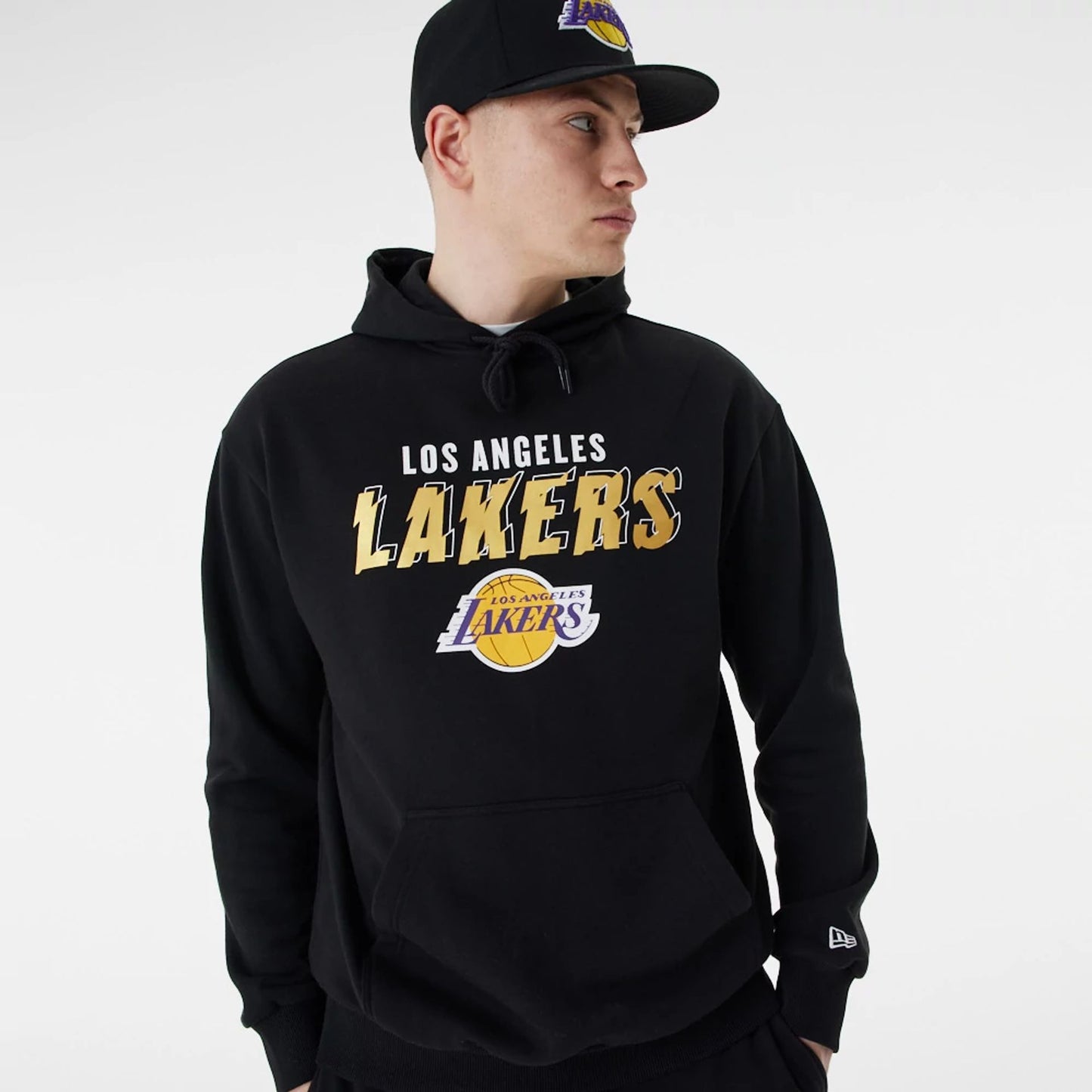 The Male model is wearing LA Lakers Team Script Black Oversized Hoodie 5